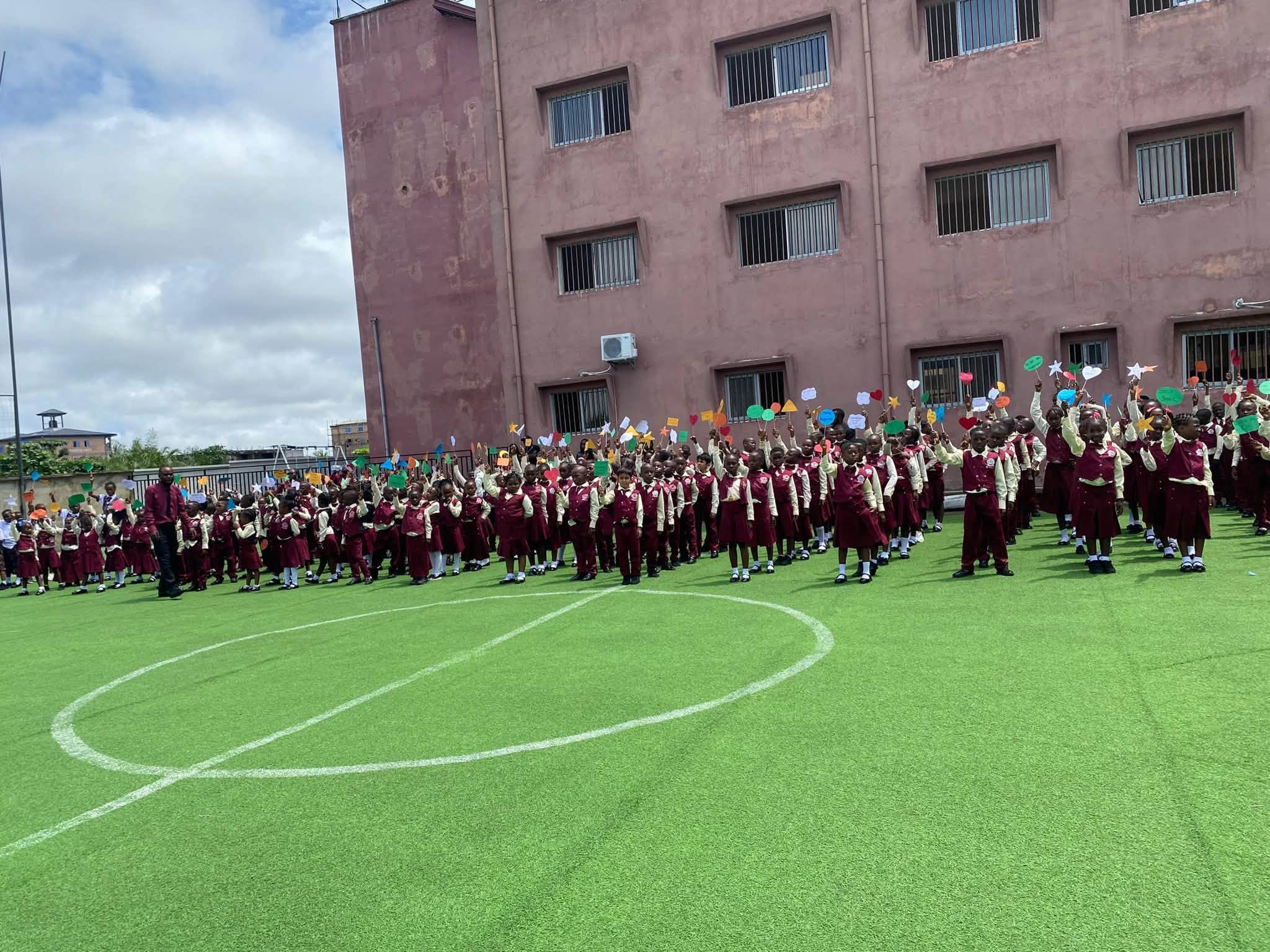 The school gathered on the pitch